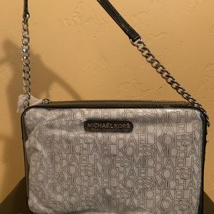 MK CROSSBODY, money will go to brother leukemia